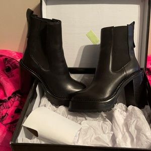 AQUA brand platform boots black leather , ag rouge size 7 never worn .